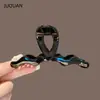 Pinza para el pelo de acrílico de color sólido con forma de ola para mujer, nuevo estilo verano 2026, simple y elegante, pinza de tiburón versátil, pinza de garra exquisita