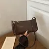 Design de nicho francês versão coreana versátil bolsa baguette padrão crocodilo bolsa de ombro retrô 2026 nova bolsa de mão bolsa de ombro