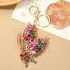 Nuevo Llavero Colgante de Mariposa de Aleación de Lujo con Pedrería de Celebridad de Internet Europea y Americana Llavero Lindo y de Moda para Bolso de Mujer