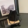Bolsa de Suerte con Cordón Nueva Colección Otoño 2026 Transfronteriza para Mujer, Bolso de Hombro Versátil Personalizado, Bolso Cubo de Gamuza