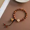 Pulsera Circular Sola de Tuya con Aceite Rojo, Loto de Madera de Durazno y Flor de Durazno, Pulsera de Aterrizaje para Hombres y Mujeres, Pulsera Cultural Creativa