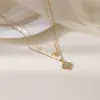 Collar multicapa de acero inoxidable chapado en oro de 18 quilates con forma de corazón, ojo de diablo incrustado con circonita, moda de tendencia de personalidad versátil para mujer