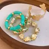 Conjunto de pulseiras abertas com flores de contas geométricas irregulares em acrílico estilo europeu e americano, joias femininas estilosas e versáteis