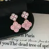 Pulseira de Zircônia com Flor de Quatro Folhas e Concha Rosa Ajustável para Mulheres com Design Vazado, Joia de Mão Exquisita e de Luxo Leve Atacado