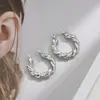 Venta caliente transfronteriza aretes geométricos irregulares brillantes en forma de C para mujer aretes retorcidos exagerados de alta calidad hebilla de oreja estilo europeo y americano