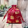 Bolsa de regalo de franela navideña, producto transfronterizo más vendido, empaque de regalo para fiesta de Navidad, bolsa con cordón estampada con lámina de oro y plata