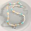 Collar de Perlas de Concha de Sirena de Amazon Exquisito Collar con Colgante de Nácar Blanco Lujo Ligero Cadena de Clavícula de Alta Gama para Mujer