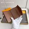 Comércio Exterior Venda Quente Bolsa Curta para Cartões com Fivela Dourada Carteira de Moedas Simples Europeia e Americana Nova Vintage Doudou Moda Tendência Feminina