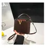 2025 Nuevo Patrón de Piedra Portátil Accesible Lujo Moda Hombro Único Retro Elegante Cruzado de Cuerpo Tendencia Bolso Cubo Pequeño para Mujer