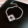 Brincos Flor de Zircônia Rombus Agulha de Prata Pulseira Anel Minimalista de Luxo Leve Conjunto de Joias Versátil de Alta Qualidade