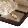 Collar Ovalado de Nácar Blanco Lele Jewelry con un Diseño Único, Colgante Chic Simple y de Moda Cadena para Clavícula con Piedra Ojo de Gato