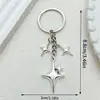 Llavero Popular de Cuatro Puntas Cruz Estrella Luna Transfronterizo Moda Colgante Decoración Simple para Bolso Amazon