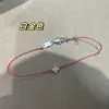 Cuerda Roja Francesa Trébol de Cuatro Hojas Pulsera de Mano para Mujer Chapada en Oro de 18k Lujo Ligero Nicho Gama Alta Hecho a Mano Pulsera de Pareja para el Año del Beneficio