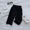 Calça Harlem para Meninos e Meninas Estilo Primavera e Outono 2026 Novo Estilo Roupa Externa para Bebê Outono Casual Calça Comprida Roupas de Outono para Crianças Calça de Moletom