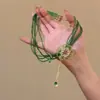 Colar com Pingente de Borla em Pedra Olho de Gato, Artesanato Resistente de Luxo Leve, Corrente para Clavícula de Alto Valor Verde Totalmente Cravejada, Estilo Floresta, Estilo Corte Gentil
