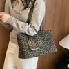 Bolso tote vintage de un solo hombro para otoño, gran capacidad, modelo nuevo, sensación de lujo ligero, bolso de mujer exquisito con estampado de leopardo 2026