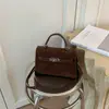 Bolso tipo Kelly transfronterizo de moda para mujer, nuevo de otoño 2026 versión coreana, bolso cruzado versátil de alta gama, bolso casual de nicho