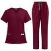 Amazon doctor enfermera salón de belleza uniforme de trabajo bata quirúrgica multibolsillo secado rápido poliéster conjunto de uniforme médico