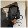 Bolso plisado de diseño único y nicho para mujer, nuevo bolso cruzado de moda 2026, bolso de mano pequeño súper popular, bolso de cuerno