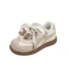 Zapatillas para niñas 2026 primavera y otoño nuevo estilo lazo para niños suela blanda zapatos casuales dulces versátiles para niñas de moda
