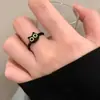Anillo lindo de ojos grandes flocado de sub-pequeño monstruo para mujer, diseño de nicho otoño e invierno, anillo avanzado para el dedo índice