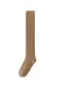 Calcetines de lana australiana gruesos, cálidos y resistentes al frío para otoño e invierno, calcetines altos elásticos antideslizantes hasta la rodilla, color liso, calcetines largos de alta gama para mujer