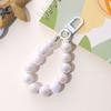 Juego de auriculares con colgante de cuentas de sirena de color caramelo, estrictamente seleccionados, adorno colgante para llavero de niña, colgante para bolso, regalo