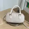 2026 Nuevo Moderno Patrón Tejido Tendencia Casual Color Sólido Elegante Para Viajes de Mujer Hombro Cruzado Portátil Bolso Almohada