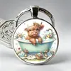 Serie de Llaveros con Diseño Creativo de Venta Caliente Transfronteriza Vaca con Relieve Rosa de las Tierras Altas Colgante para Bolso de Aleación de Gema del Tiempo