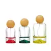 Venta Directa de Fábrica Botella de Perfume de Vidrio Cilíndrica Fondo Volcánico 30ml 50ml 100ml Botella Vacía Botella con Atomizador Fondo Grueso Tapa de Bola