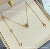 Collar de resorte pequeño Baojia versión de alta gama en oro V, versión de alta gama CNC, modelo de caridad para celebridades, cadena para clavícula chapada en oro de 18k con cerámica