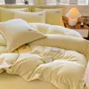 Conjunto de quatro peças de veludo de leite espesso 2026 novo inverno veludo coral veludo dupla face capa de edredom conjunto de cama de flanela de três peças