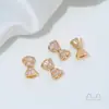 Cuentas Espaciadoras de Cobre Chapado en Oro de 14 Quilates con Forma de Lazo y Agujero Pasante para Accesorios de Pulseras de Cristal y Perlas DIY