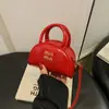 Bolso de Mujer con Letras de Bolos de Nicho 2025 Nuevo Bolso Caja Media Luna para Viajes Cotidianos Mini Portátil Cruzado Bolso para Niños de Moda