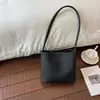 Bolso de axila de nicho de alta gama para mujer, nuevo modelo de verano 2026, bolso de cubo de axila de un solo hombro súper popular y exquisito
