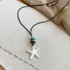 Collar de cordón de cuero con perla cuadrada de acrílico, estilo vintage y artístico, cadena para suéter, diseño único, joyería de lujo ligera, venta al por mayor