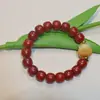 Al por mayor original ecológico semilla antigua sur rojo bodhi cinabrio para pulsera de danza del león accesorios multiestilo cuentas de discípulo cuentas cuentas