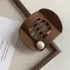 Rascador de Pelo Perla Negra Vintage para la Parte Posterior de la Cabeza Disco Pinza de Pato para el Cabello 2025 Nuevo Todo-partido Sentido de Alta Gama Pasador para el Cabello de la Parte Posterior de la Cabeza