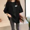 Camiseta de seda de leche nueva de verano, cuello redondo, holgada, manga corta, 2026, para estudiantes mujeres, estilo casual, top estampado de longitud media