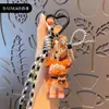 Pulseira de Urso com Estampa de Leopardo de Desenho Animado Original Chaveiro Boneca Pingente Casal Carro Mochila Decoração de Chaveiro Presente