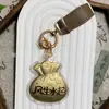 Llavero de Oro Puro 999 Bolsa de la Suerte para Atraer Riqueza y Prosperidad, Colgante de Bolsa, Cadena para Teléfono, Venta al por Mayor de Fábrica
