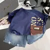 Conjunto de Camiseta de Manga Corta y Pantalones Cortos para Niños 2026 Bolsillo Artesanal Fresco y Guapo Camiseta Conjunto de Dos Piezas de Verano para Bebé Moderno