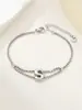 Nuevo Anillo de Acero Inoxidable al por Mayor Transfronterizo 26 Letras Inglesas Anillo de Doble Capa Pulsera Chapada en Oro