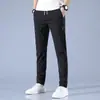 Pantalones casuales de seda de hielo finos de verano para hombre, tendencia de trabajo, holgados, rectos, transpirables, deportivos, cortos, para hombre