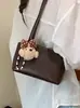 Nova bolsa de axila de nicho de alta qualidade para mulheres no comércio exterior transfronteiriço, bolsa quadrada pequena texturizada, simples e fashion, bolsa de ombro para o dia a dia
