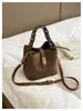 Bolso Cubo de Mano Simple de Nicho Estilo Coreano para Mujer Otoño 2026 Nuevo Estilo Bolso de Hombro con Temperamento de Moda Bolso Cruzado para el Trabajo