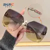 Gafas de Sol de Moda Sin Marco Estilo Nuevo, Gafas de Sol Versátiles de Gama Alta para Mujer, Gafas de Sol Modernas y Tendencia Anti-UV