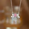Collar de acero y titanio con doble anillo de amor para mujer, oro de 18 quilates, diseño de nicho de lujo ligero, sensación de elegancia, cadena de clavícula de celebridades de Internet, accesorios