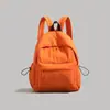 Mochila Sencilla de Color Sólido para Mujer Modelo Nuevo 2026 Mochila Escolar Ligera de Gran Capacidad para Estudiantes de Secundaria y Preparatoria Mochila para Viajes Cortos