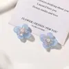 Flor de cristal dulce y versátil, centro de resina con degradado, flor de cuatro pétalos, arete DIY, pinza para el cabello, charm para zapatos y accesorio de ropa